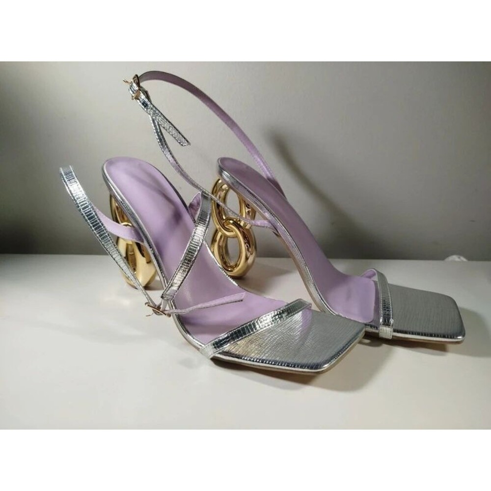 Gold figure-8 shaped heels